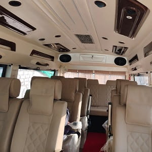 10 seater luxury tempo traveller rentals in bangalore price per km