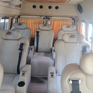 8 seater luxury tempo traveller rentals in bangalore maharaja photo