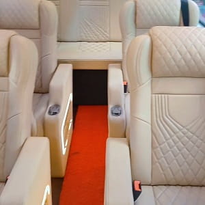 9 seater luxury tempo traveller rentals in bangalore interior