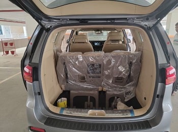 kia carnival for rent in bangalore airport rear interior