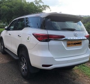 Toyota Fortuner cab parked